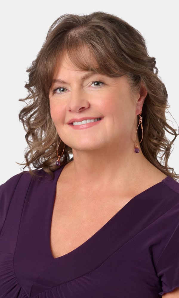 Model showing off wire wrapped earrings